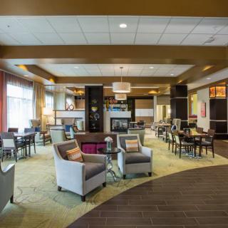 A modern lounge area with comfortable seating and a cozy atmosphere.