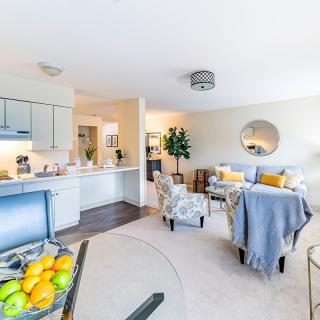 A modern open-concept living area featuring a bright and inviting interior with contemporary furniture and decor.