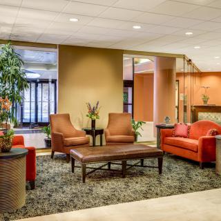 A modern lobby with comfortable seating and tasteful decor.