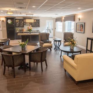 A modern living room with comfortable seating and elegant decor.
