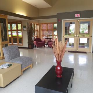 A cozy lobby area featuring comfortable seating and a welcoming atmosphere.