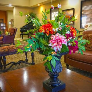 A beautifully arranged floral display in a stylish interior setting.