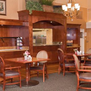 A cozy dining area with wooden furniture and a warm ambiance.