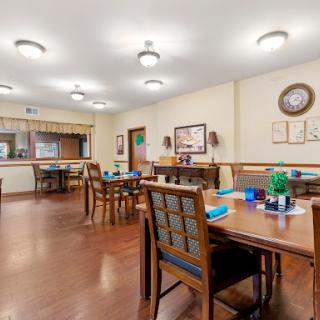 A cozy communal dining area designed for social gatherings and meals.