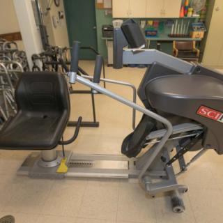 A specialized exercise machine used for rehabilitation and physical therapy.