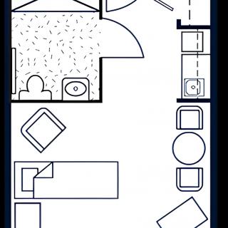 A simple floor plan illustrating the layout of a room with furniture and bathroom.