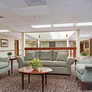 A cozy lobby area featuring a sofa set and coffee table.