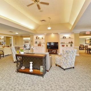 A spacious and cozy living room with elegant decor and comfortable seating.