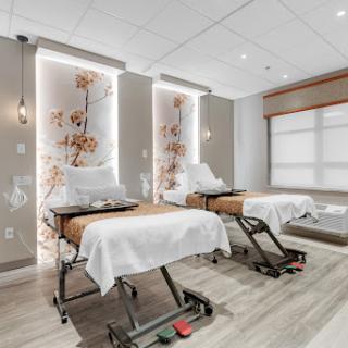 A serene spa treatment room designed for relaxation and wellness.