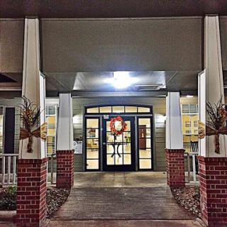 Welcoming entrance adorned with seasonal decorations.