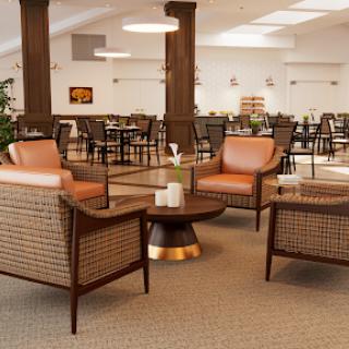 A cozy lounge area featuring stylish seating and elegant decor.