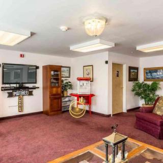 A cozy lobby with comfortable seating and decorative elements.