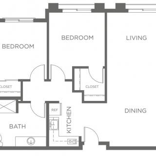 A floor plan showing the layout of a two-bedroom apartment with a kitchen, bathroom, living room, and dining area.
