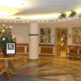 A cozy hotel lobby with elegant decor and comfortable seating.