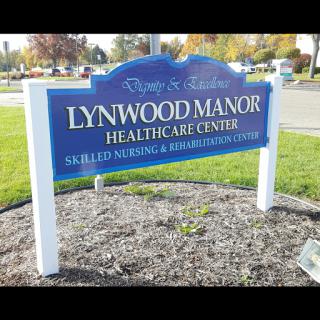 Sign for Lynwood Manor Healthcare Center, highlighting its skilled nursing and rehabilitation services.