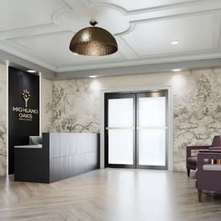A modern and elegant reception area featuring stylish furniture and decorative lighting.