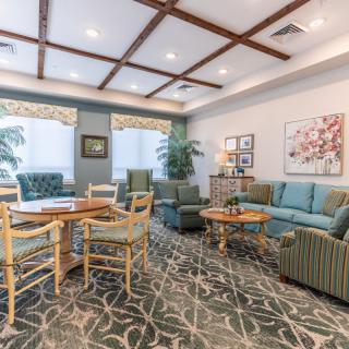 A cozy living room with comfortable seating and elegant decor.