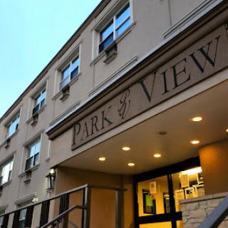The entrance of the Park View apartment building, showcasing a welcoming facade.