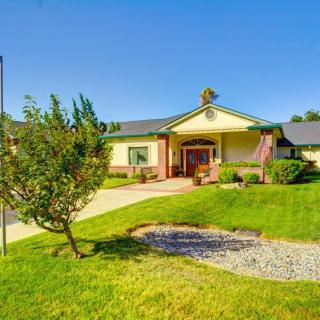 A suburban house with a well-maintained front yard and pathway.