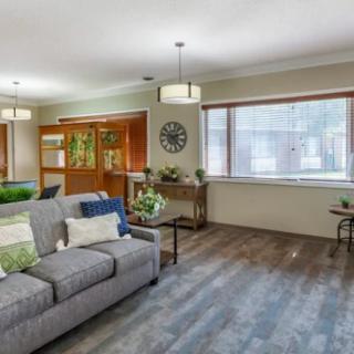 A modern living room with a comfortable sofa and stylish decor.
