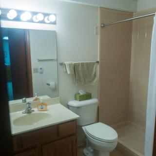 A clean and simple bathroom with essential fixtures.