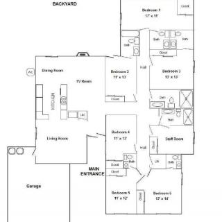 A detailed floor plan of a residential home showing multiple bedrooms, bathrooms, a kitchen, living room, dining area, and garage.