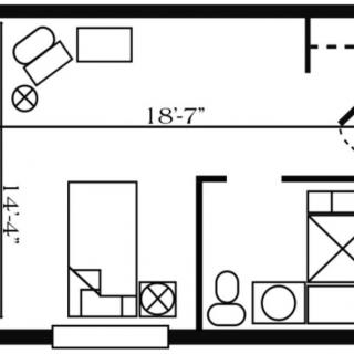 A simple floor plan showing the layout of a room with furniture and measurements.