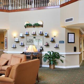 A cozy lobby area with comfortable seating and decorative elements.