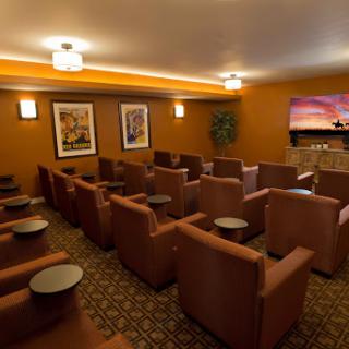 A cozy lounge area with comfortable seating, perfect for enjoying a movie.