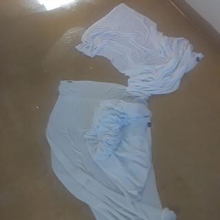 Towels spread out on a wet floor for absorption.