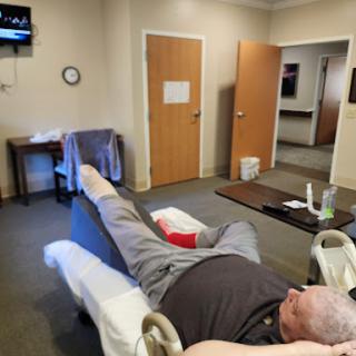A patient undergoing rehabilitation therapy in a medical facility.