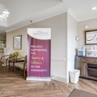 A welcoming lobby featuring a banner promoting community support services.