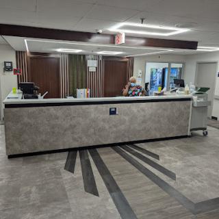 A modern reception area with a sleek counter and welcoming ambiance.