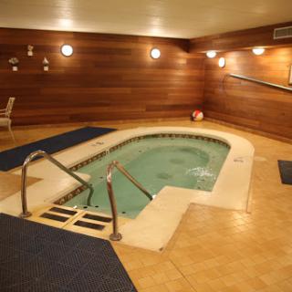 A serene indoor hot tub, perfect for relaxation and unwinding.