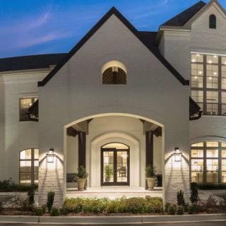 Modern residential house with elegant architecture and night lighting.