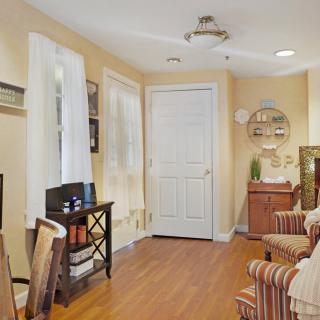 A cozy living room with comfortable seating and tasteful home decor.