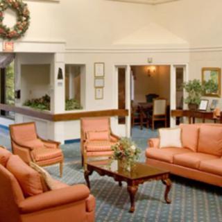 A cozy living room with comfortable seating and a welcoming atmosphere.