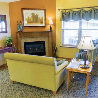 Cozy living room with a fireplace and comfortable seating.