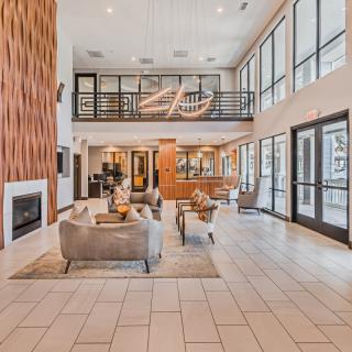 A modern, spacious lobby with comfortable seating and abundant natural light.