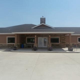 Front view of a building with a modern architectural design.