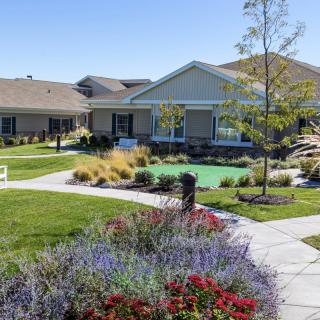 A beautiful residential area with a well-maintained garden and pathways.