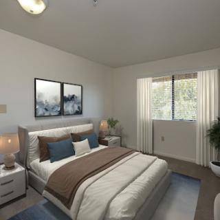 A bright and modern bedroom featuring a comfortable bed, stylish decor, and ample natural light.