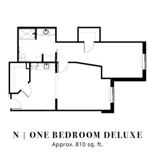 Floor plan of a one-bedroom deluxe apartment, approximately 810 sq. ft.