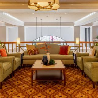 A stylish living room with modern furniture and elegant decor.