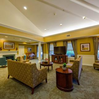 A cozy living room with elegant decor and comfortable seating arrangements.