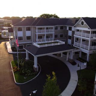 A beautiful residential building captured during sunset.