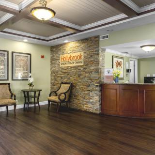 A welcoming reception area with stylish furniture and warm lighting.