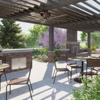 A sunny outdoor patio with a pergola, featuring tables and chairs surrounded by lush greenery.