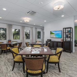 A modern dining area with elegant furnishings and decor.