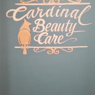 Cardinal Beauty Care logo with bird illustration and stylized text.
